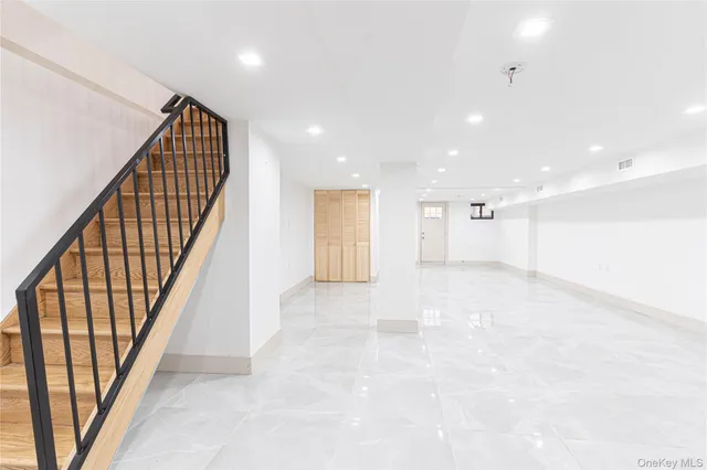 a view of an entryway with stairs