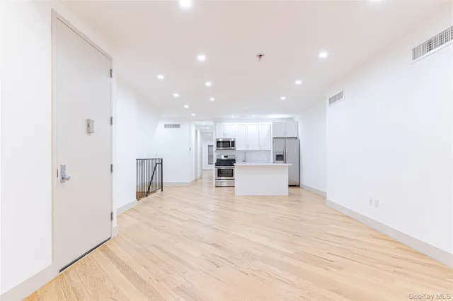 a view of kitchen with wooden floor