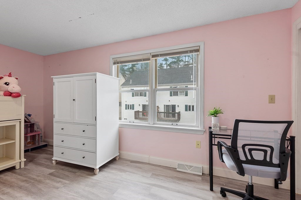 25 Century Way, Unit 25 Gardner, MA 01440 - Photo 26 of 34 a view of a livingroom with furniture hardwood floor and a window