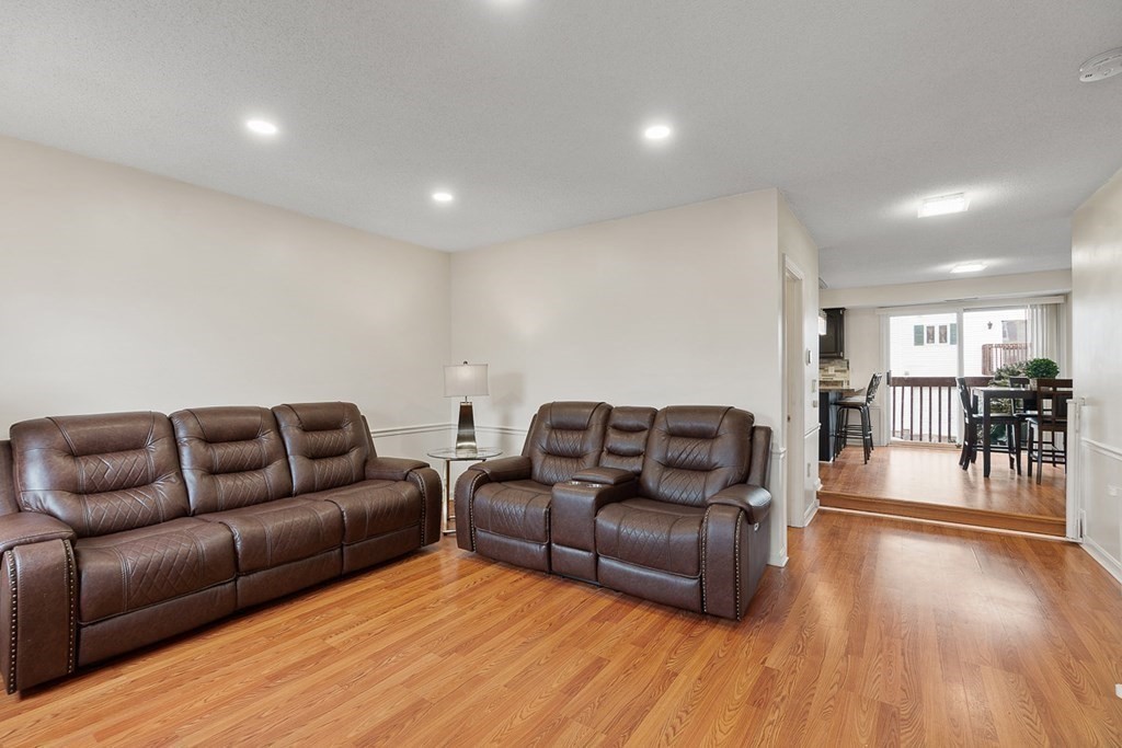 25 Century Way, Unit 25 Gardner, MA 01440 - Photo 6 of 34 a living room with furniture and wooden floor