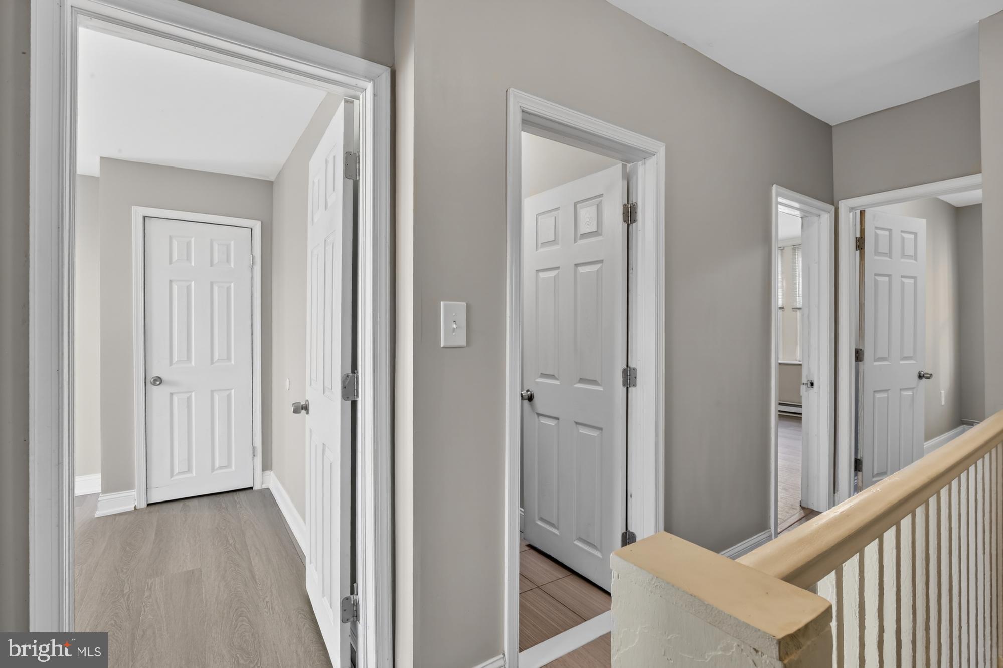 1640 South 28th Street Philadelphia, PA 19145 - Photo 13 of 27 a view of a hallway with wooden floor