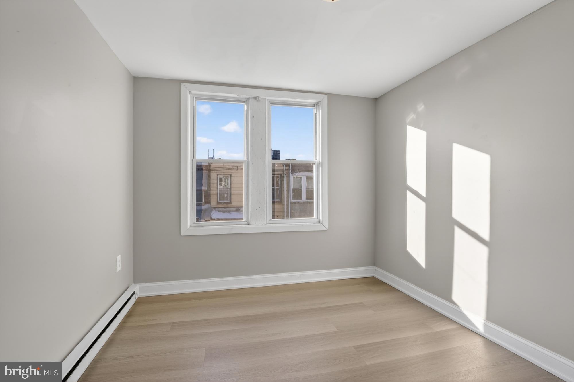 1640 South 28th Street Philadelphia, PA 19145 - Photo 17 of 27 a view of an empty room with a window