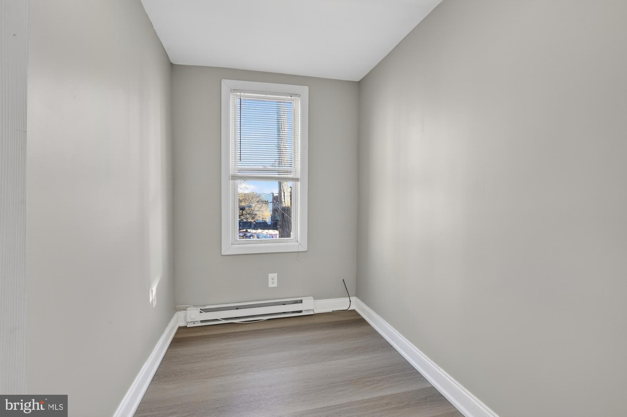 1640 South 28th Street Philadelphia, PA 19145 - Photo 23 of 27 a view of an empty room with a window