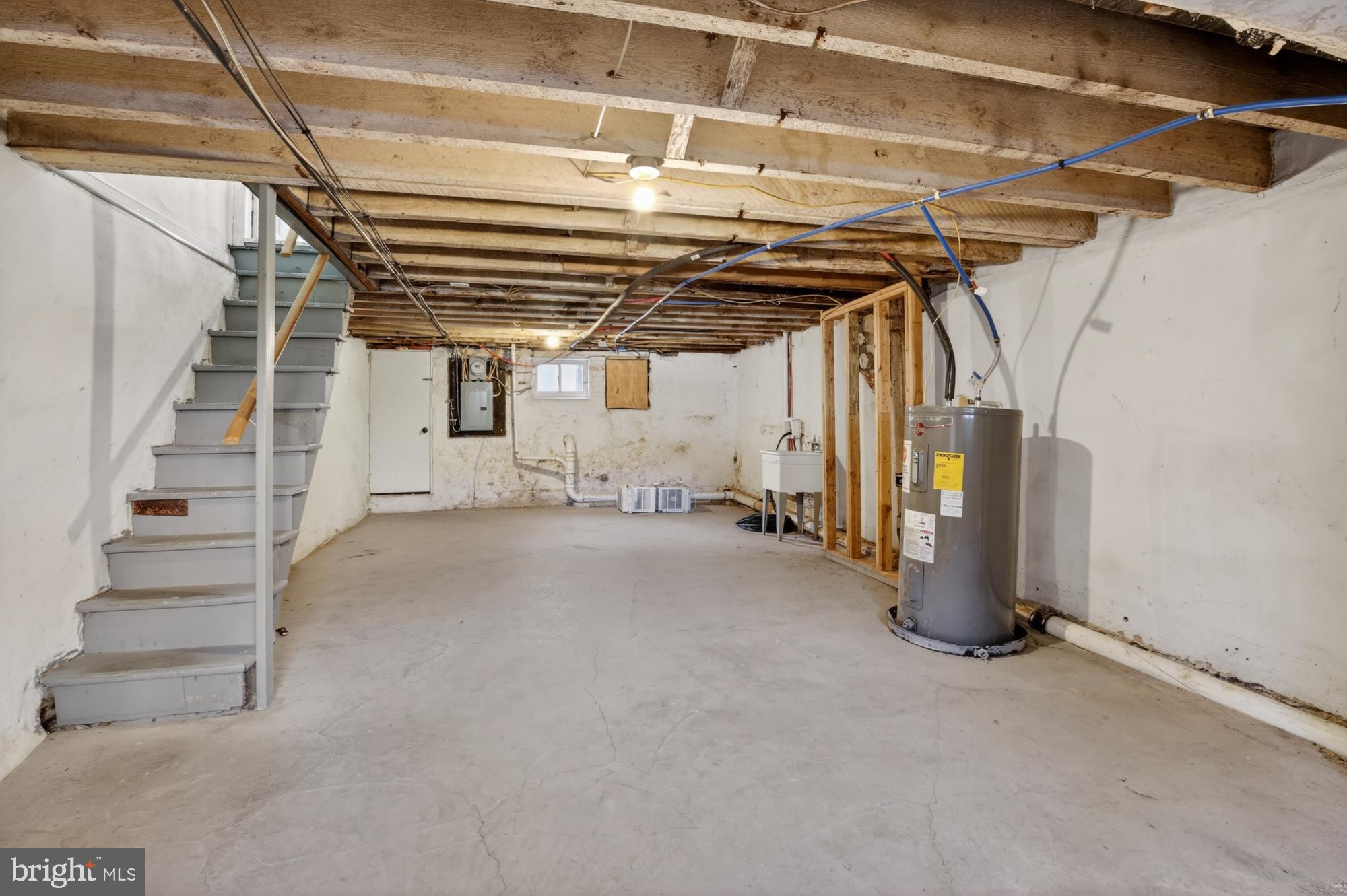 1640 South 28th Street Philadelphia, PA 19145 - Photo 10 of 27 a view of a room with stairs and a furniture