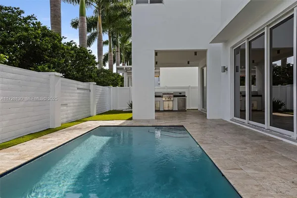 a view of a house with swimming pool