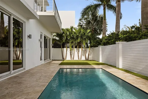 a backyard of a house with a garden