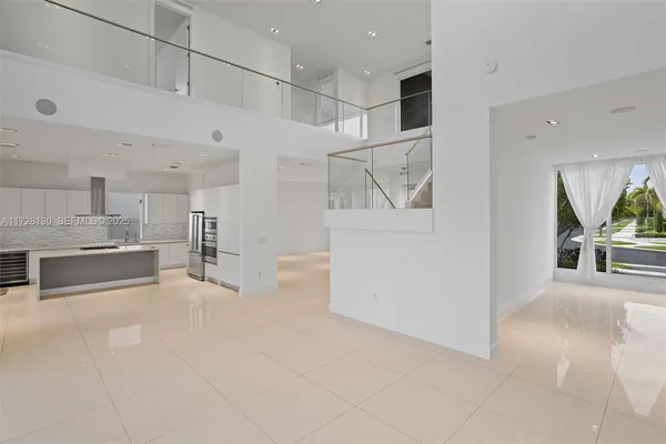 a view of a kitchen with furniture and a kitchen