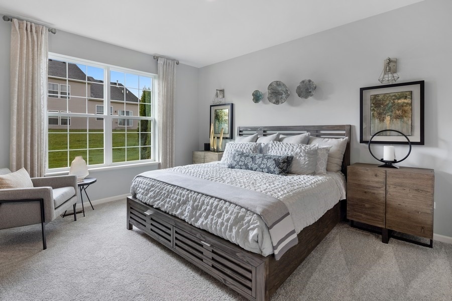 25616 West Springview Drive Plainfield, IL 60586 - Photo 12 of 23 a bedroom with a bed and window