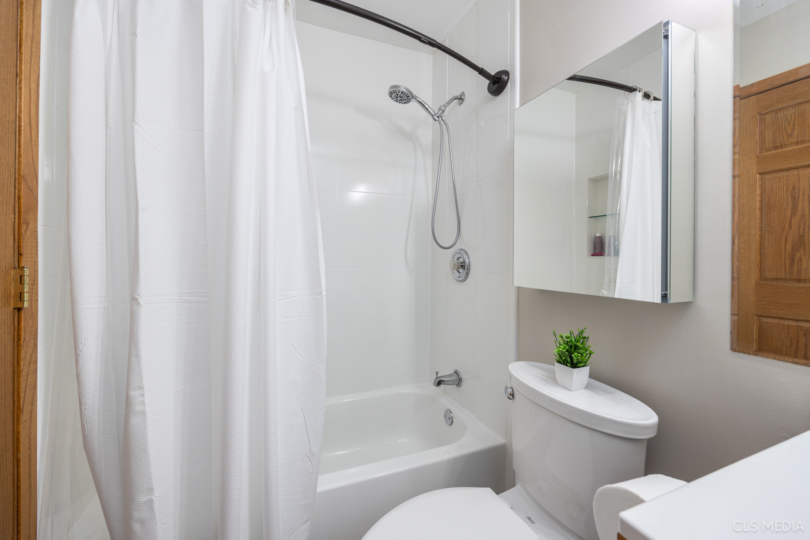 2115 Tiffany Drive Schaumburg, IL 60193 - Photo 15 of 23 a white toilet sitting next to a bath tub