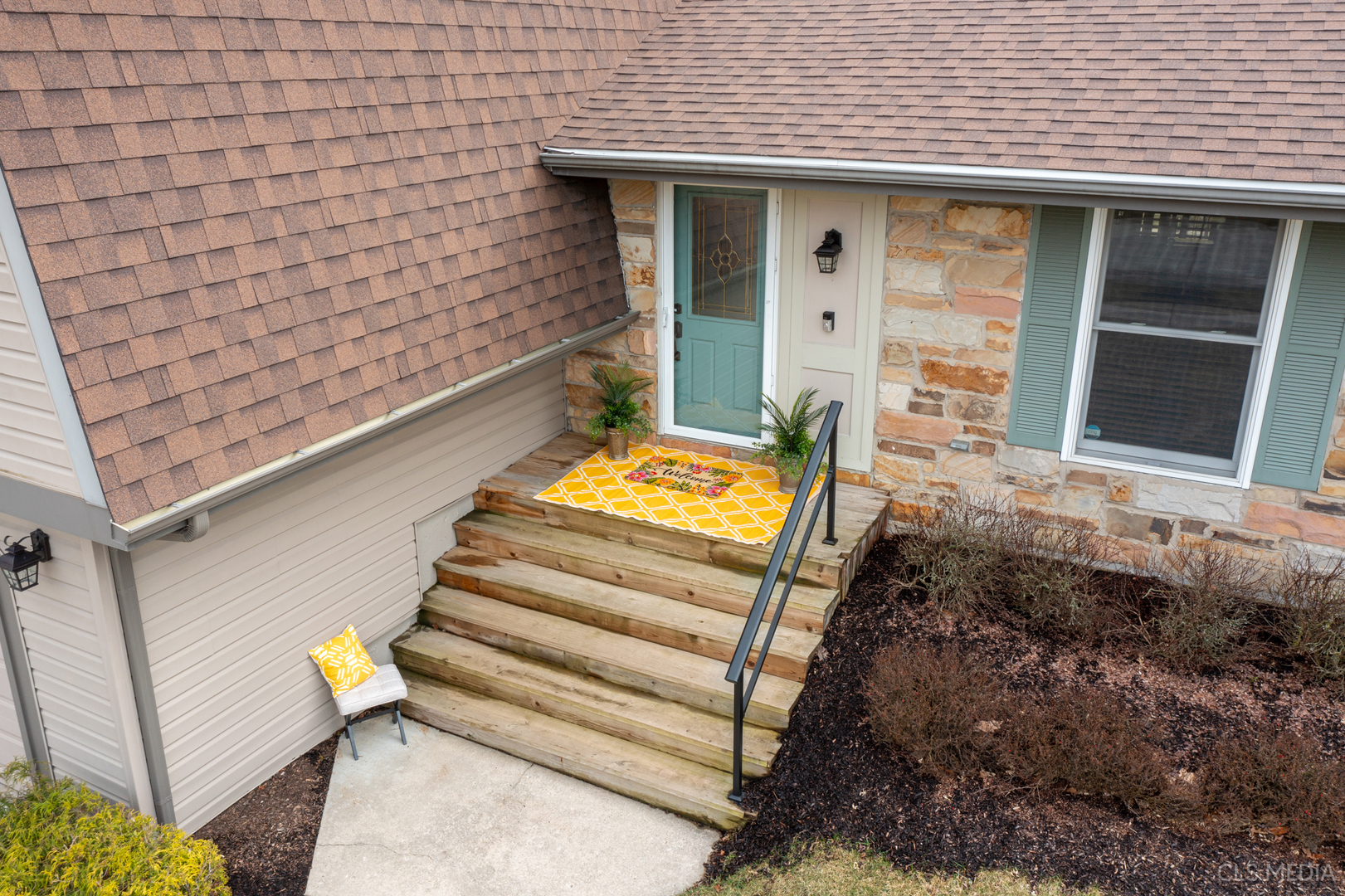 2115 Tiffany Drive Schaumburg, IL 60193 - Photo 2 of 23 a front view of a house with stairs
