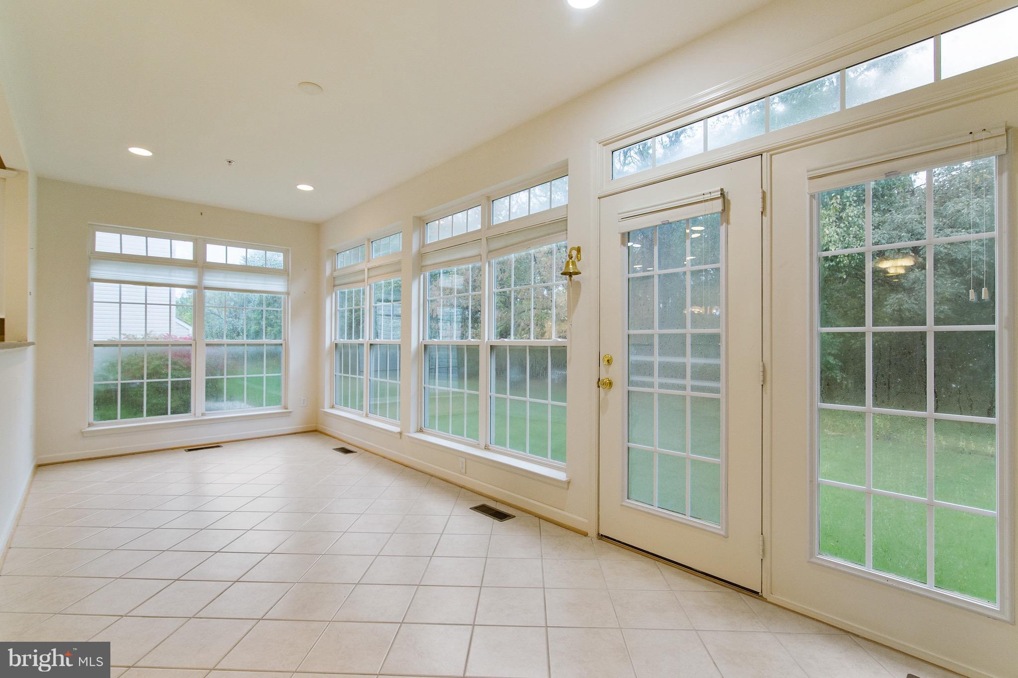 14213 Punch Street Silver Spring, MD 20906 - Photo 5 of 29 Sunroom off to the Kitchen