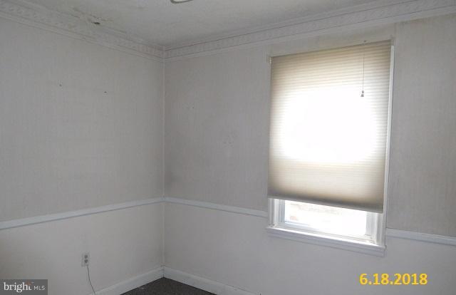 1234 Hillside Road Pasadena, MD 21122 - Photo 5 of 12 a view of an empty room