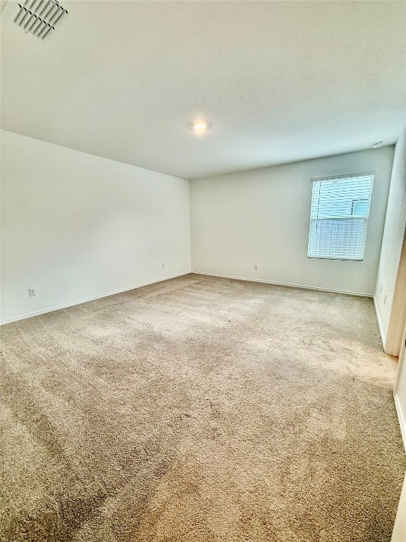 716 Commander Abbott Drive Jarrell, TX 76537 - Photo 11 of 17 an empty room with a natural light