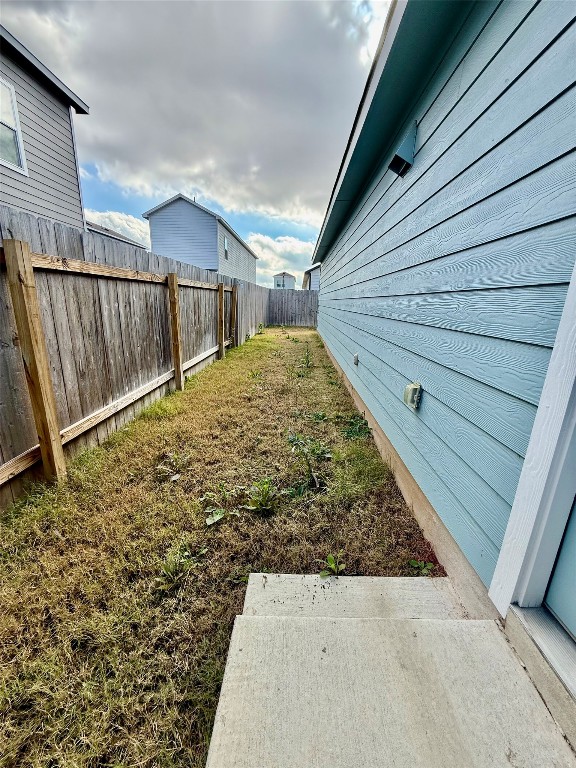 716 Commander Abbott Drive Jarrell, TX 76537 - Photo 15 of 17 a view of a backyard