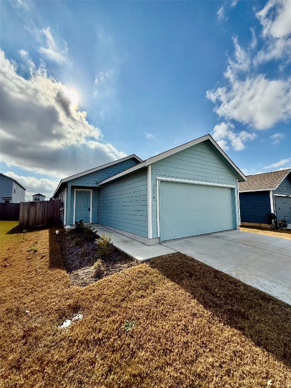716 Commander Abbott Drive Jarrell, TX 76537 - Photo 2 of 17 a house view with a backyard space