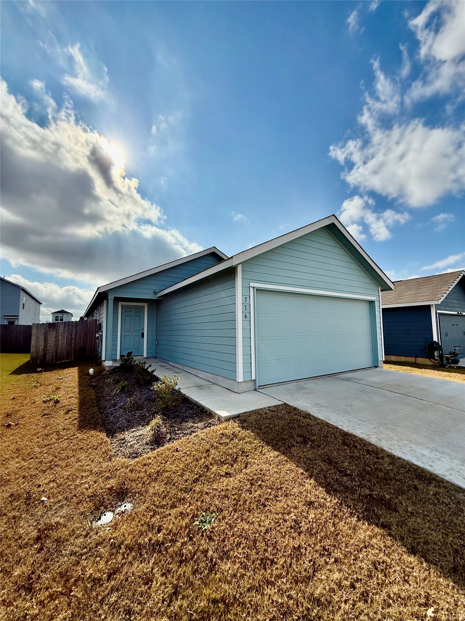 716 Commander Abbott Drive Jarrell, TX 76537 - Photo 2 of 17 a house view with a backyard space