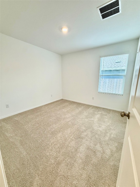 716 Commander Abbott Drive Jarrell, TX 76537 - Photo 10 of 17 an empty room with a workbench