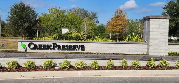 a view of a sign board with street