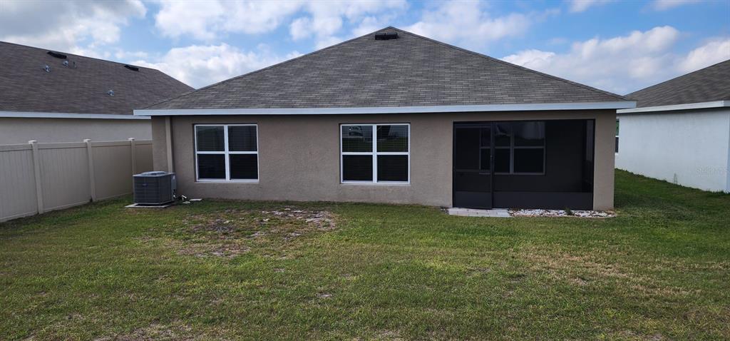 16778 Carlton Pond Street Wimauma, FL 33598 - Photo 8 of 27 a view of a backyard