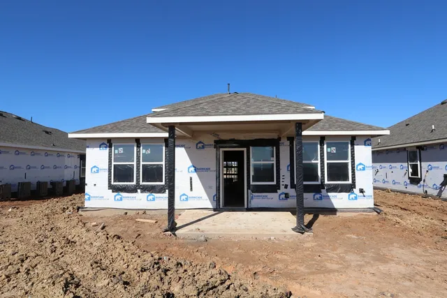 a view of a house with a patio