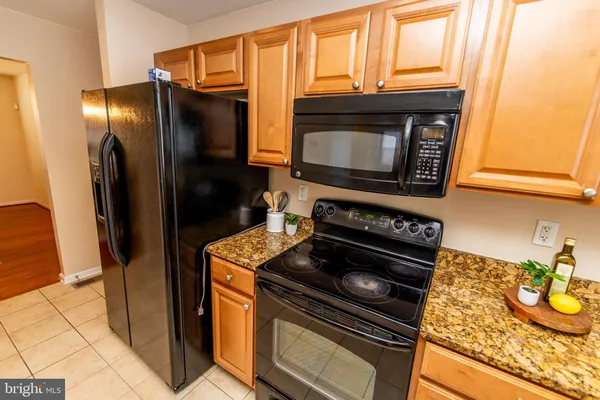 a view of a kitchen from a door