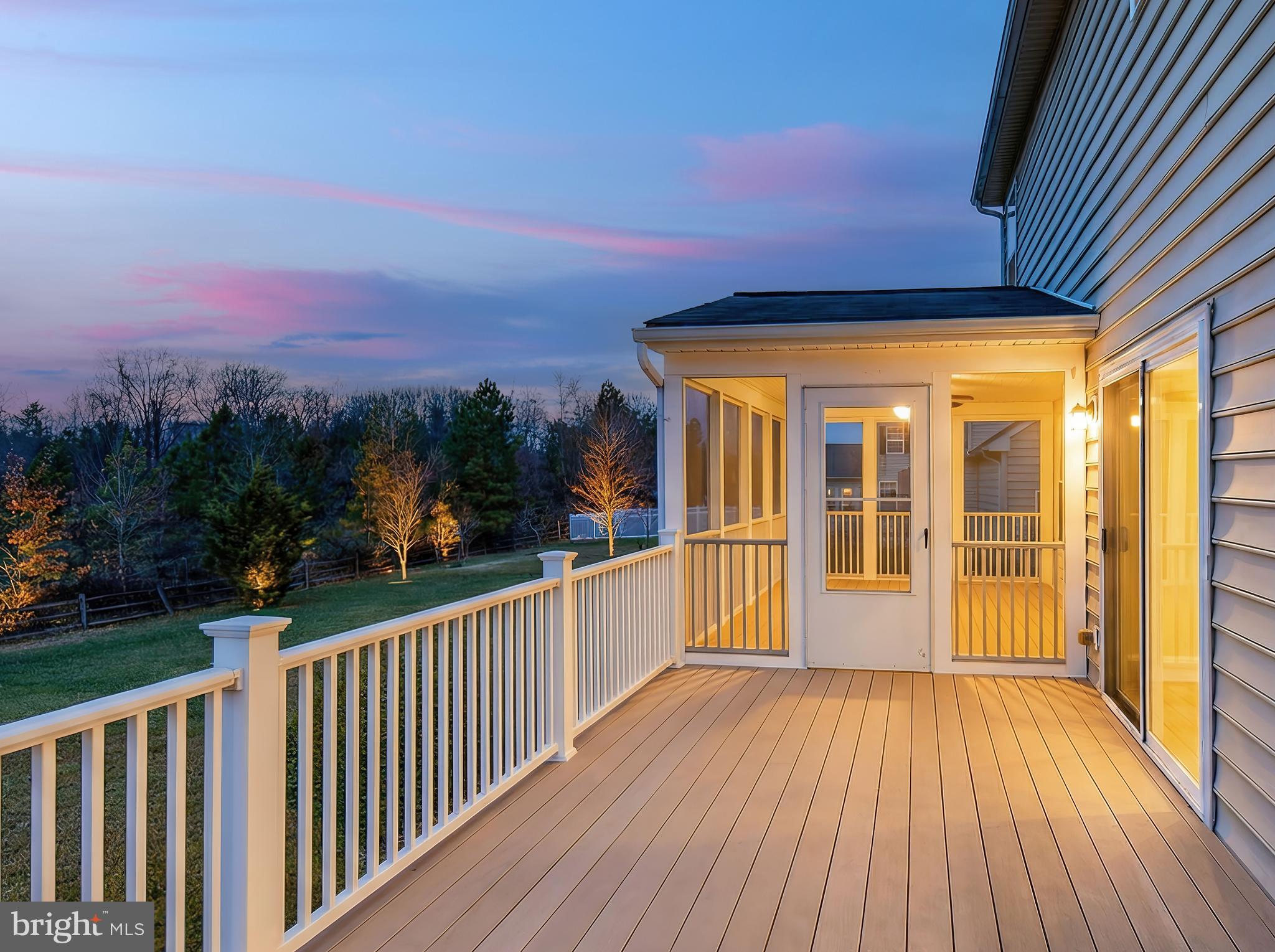13400 Oaklands Manor Drive Laurel, MD 20708 - Photo 2 of 44 a view of a balcony with wooden floor and city view