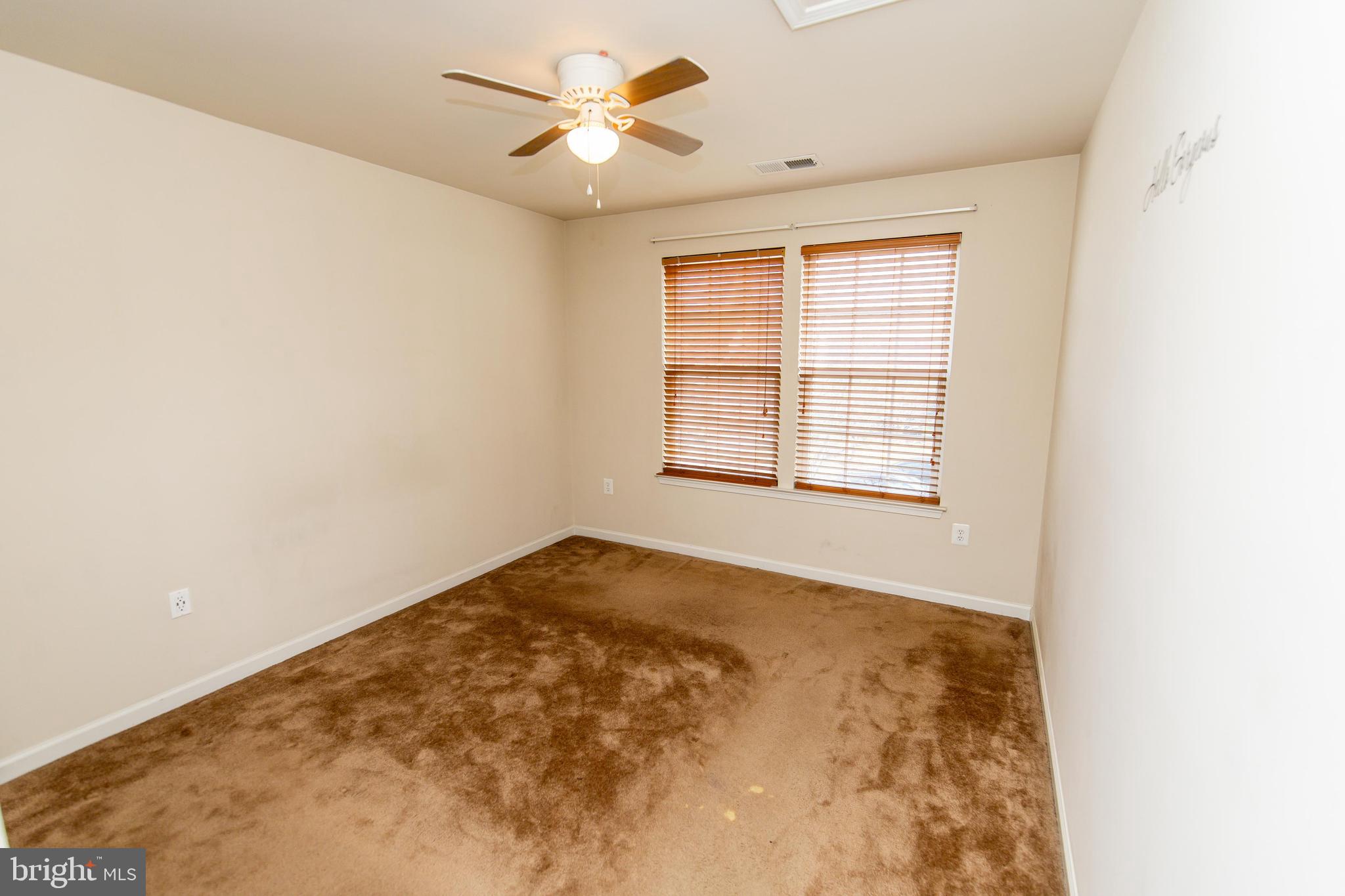 13400 Oaklands Manor Drive Laurel, MD 20708 - Photo 24 of 44 an empty room with a window
