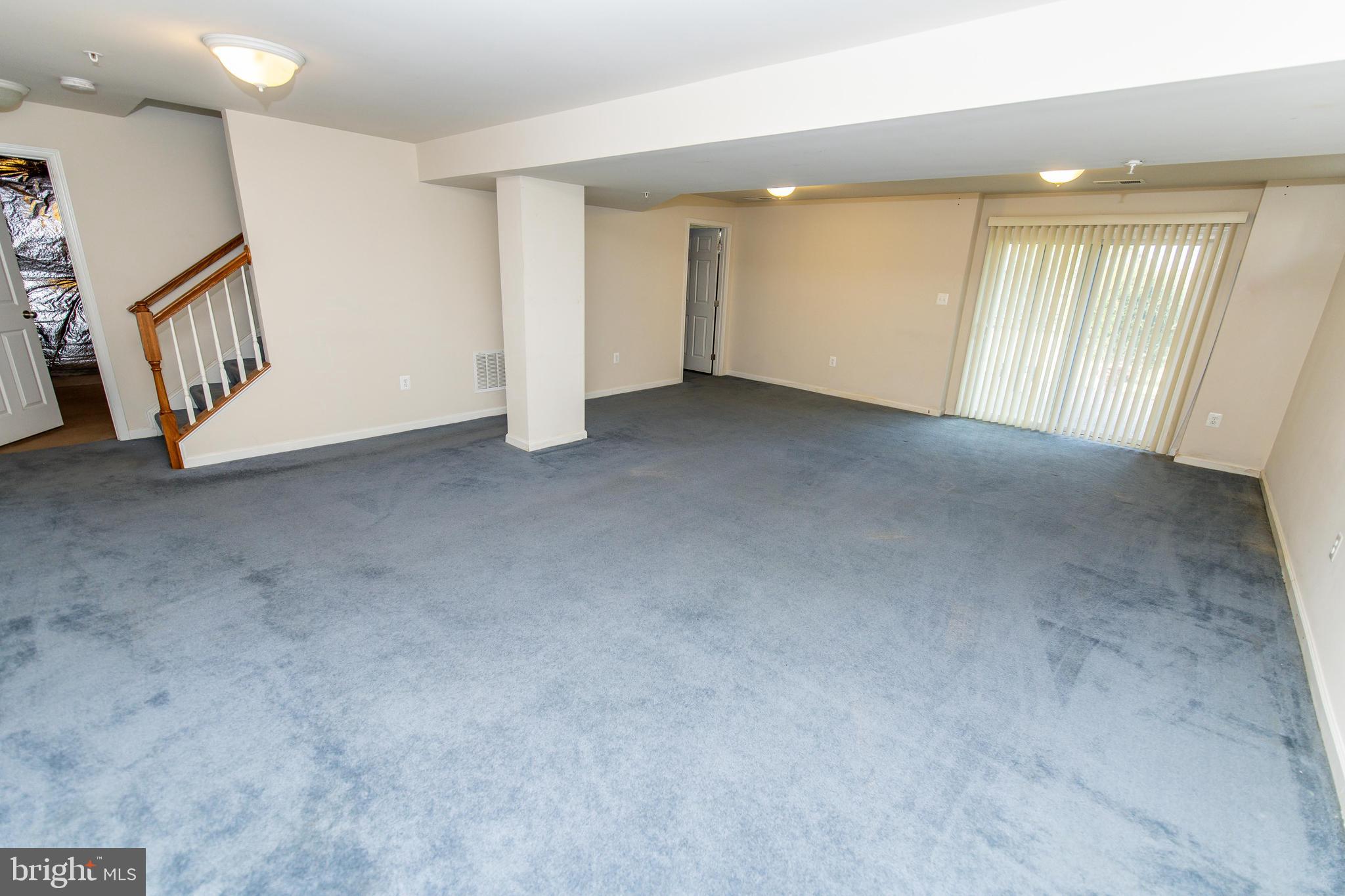 13400 Oaklands Manor Drive Laurel, MD 20708 - Photo 32 of 44 a view of an empty room with a window