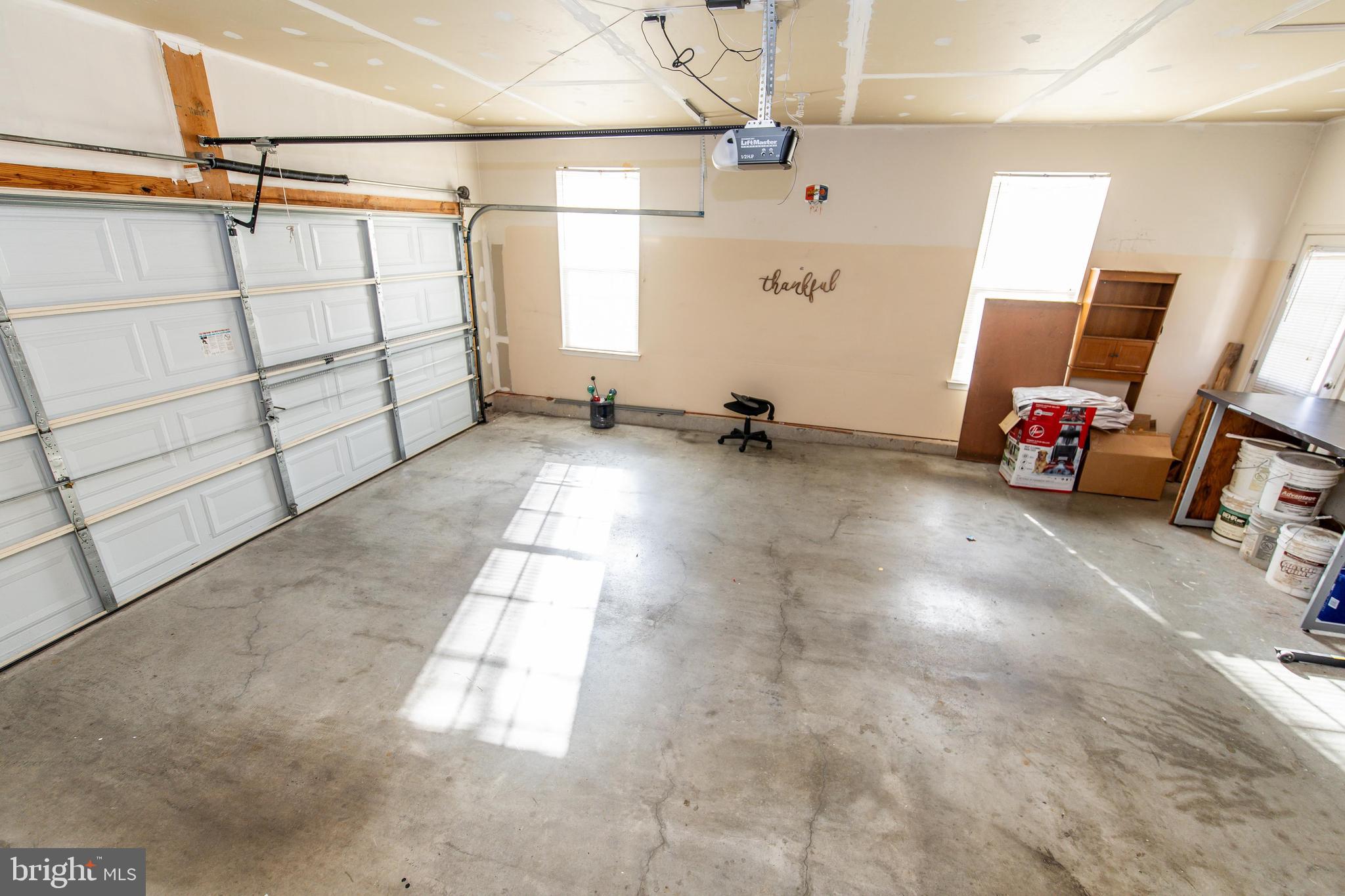 13400 Oaklands Manor Drive Laurel, MD 20708 - Photo 34 of 44 a view of a garage with storage