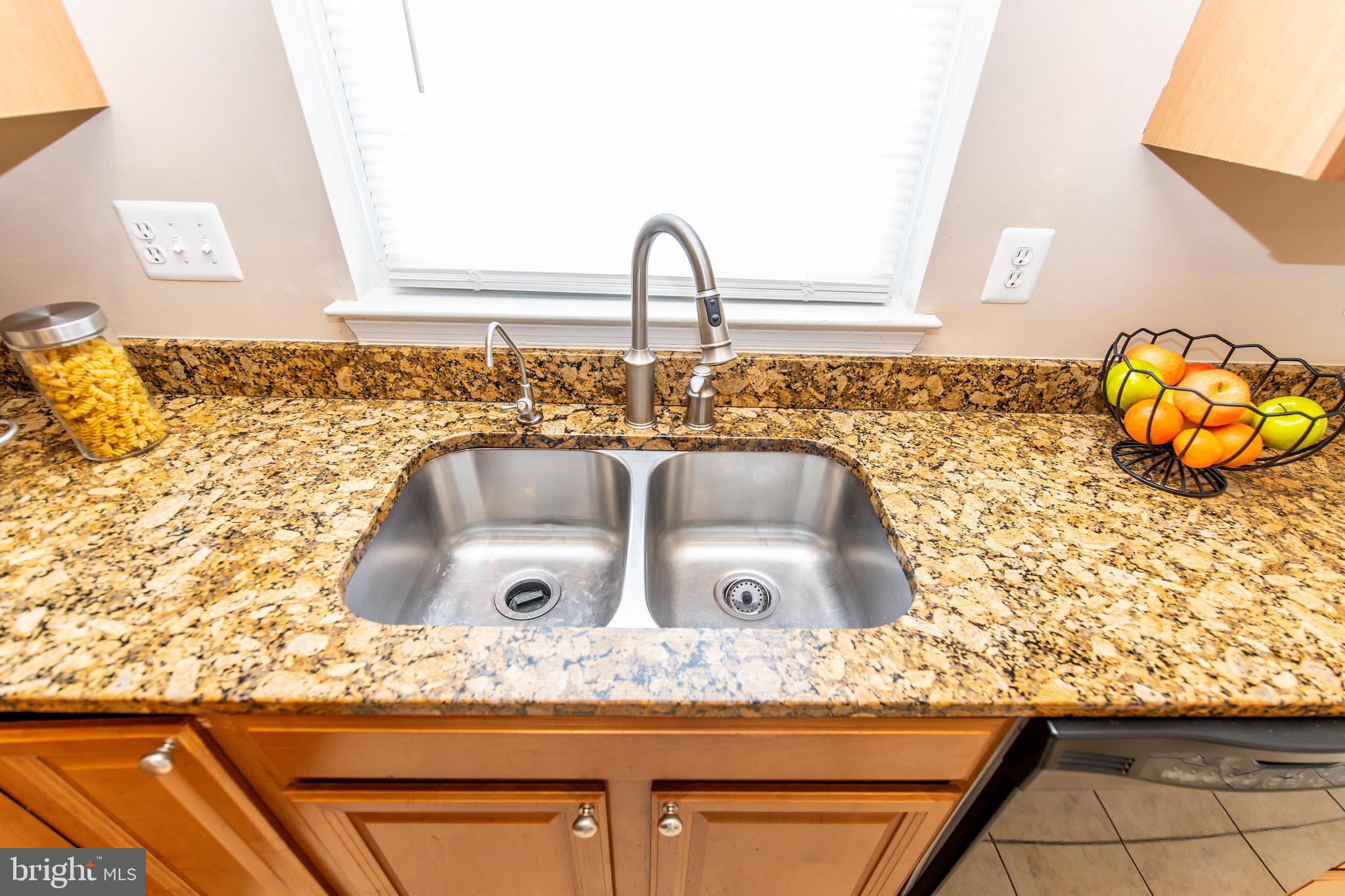 13400 Oaklands Manor Drive Laurel, MD 20708 - Photo 9 of 44 a close view of sink and tap