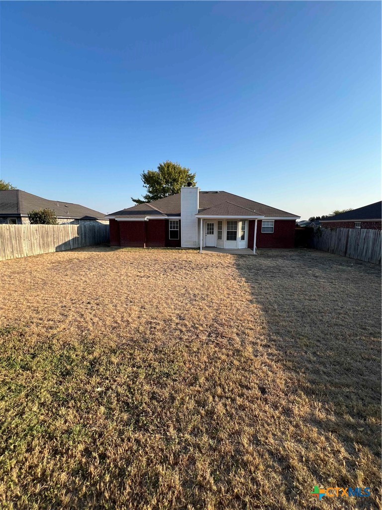 1704 Boydstun Loop Killeen, TX 76542 - Photo 2 of 11 a view of a house with a yard