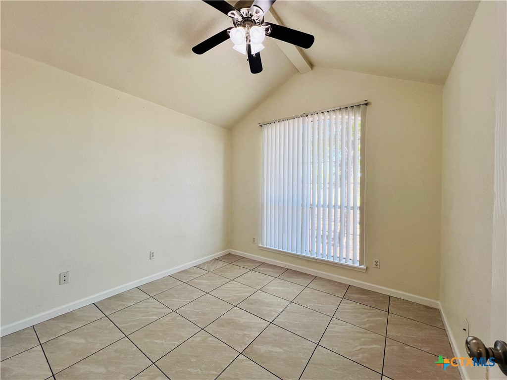 1704 Boydstun Loop Killeen, TX 76542 - Photo 9 of 11 a view of an empty room and chandelier fan