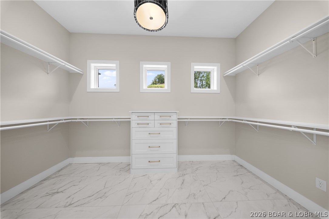 439 Red Bud Road Lake Ozark, MO 65049 - Photo 48 of 98 Spacious walk-in master closet.