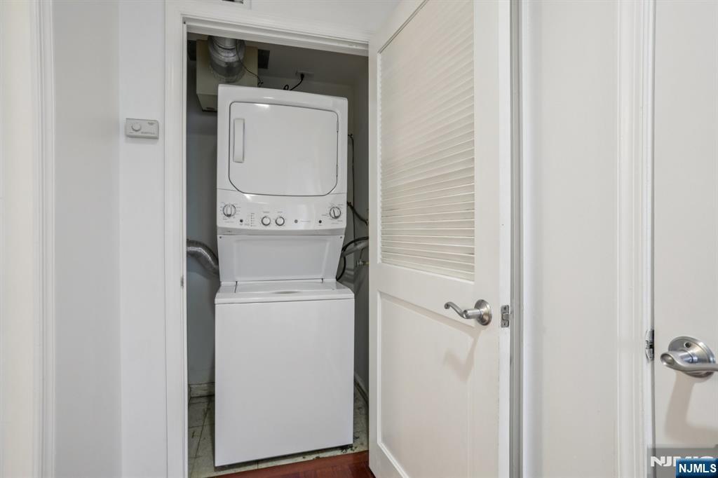 3110 City Place Edgewater, NJ 07020 - Photo 36 of 36 a utility room with dryer and washer