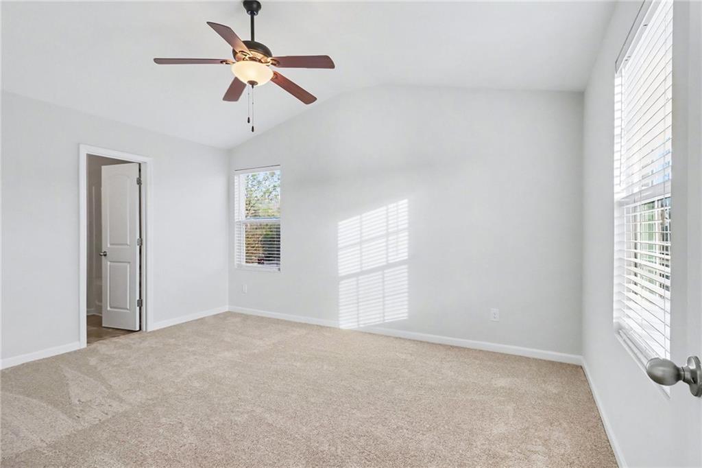 1235 To Lani Path Stone Mountain, GA 30083 - Photo 19 of 33 wooden floor in an empty room with a window