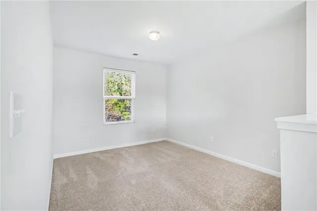 an empty room with window