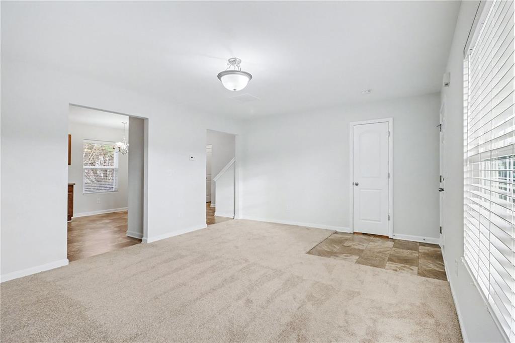 1235 To Lani Path Stone Mountain, GA 30083 - Photo 8 of 33 a view of an empty room and window