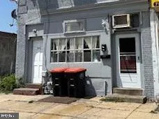 a view of a dinning table and chairs in the patio