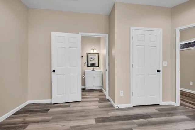 a view of a livingroom from a hallway