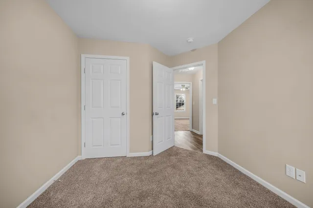 a view of a room that has a toilet in it