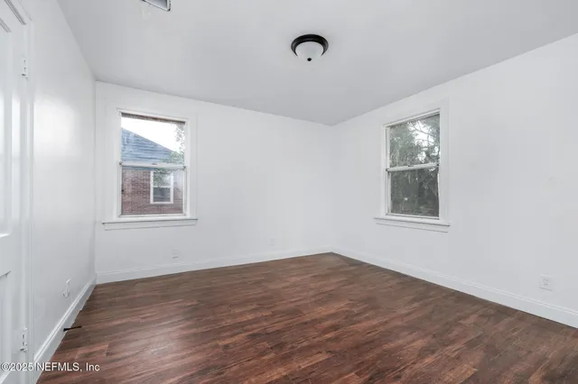 a view of a room that has a window in it