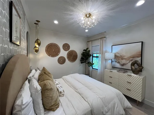 a view of a swimming pool and outdoor seating