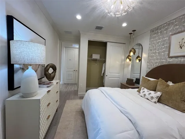 an empty room with large windows