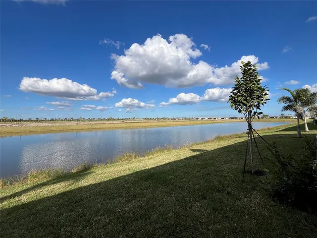 a kitchen with a table and chairs in it