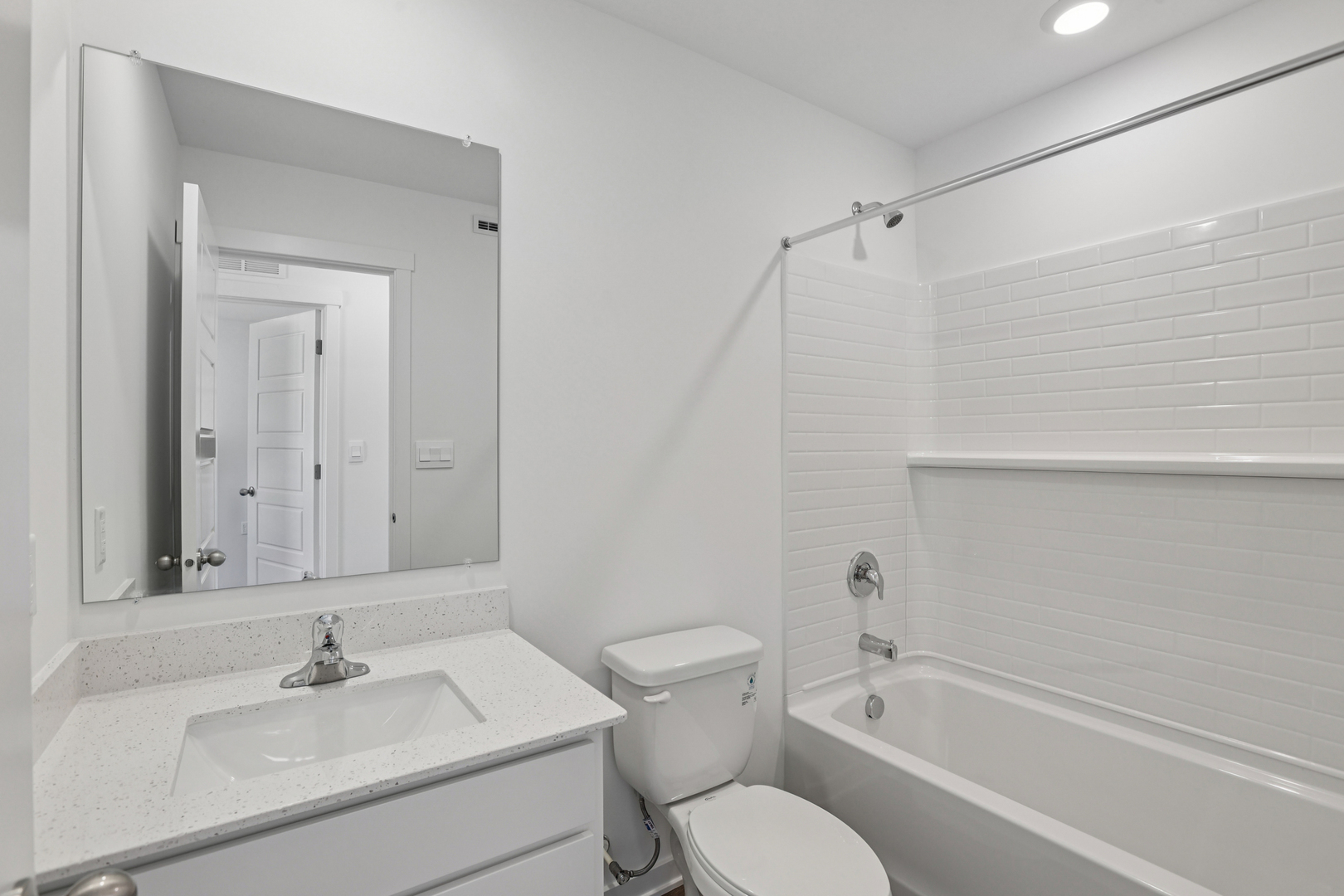 6510 Linden Trail, Unit C Wonder Lake, IL 60097 - Photo 11 of 24 a bathroom with a sink toilet and shower