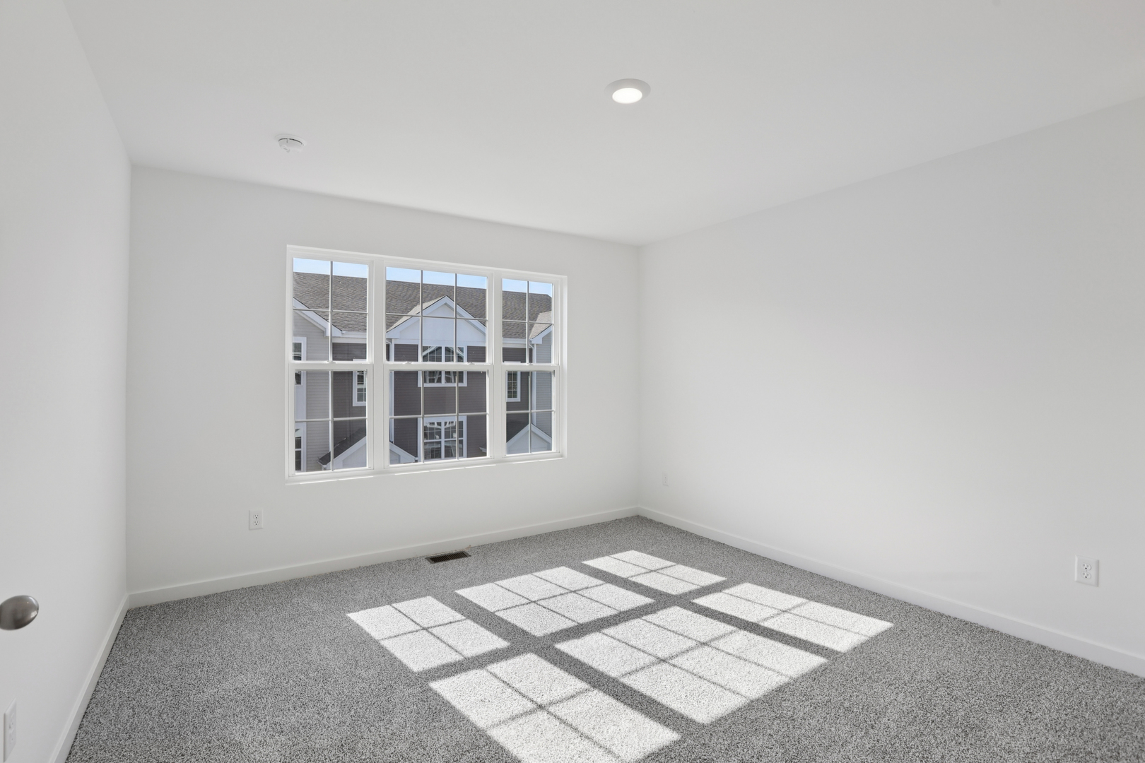 6510 Linden Trail, Unit C Wonder Lake, IL 60097 - Photo 6 of 24 an empty room with a window