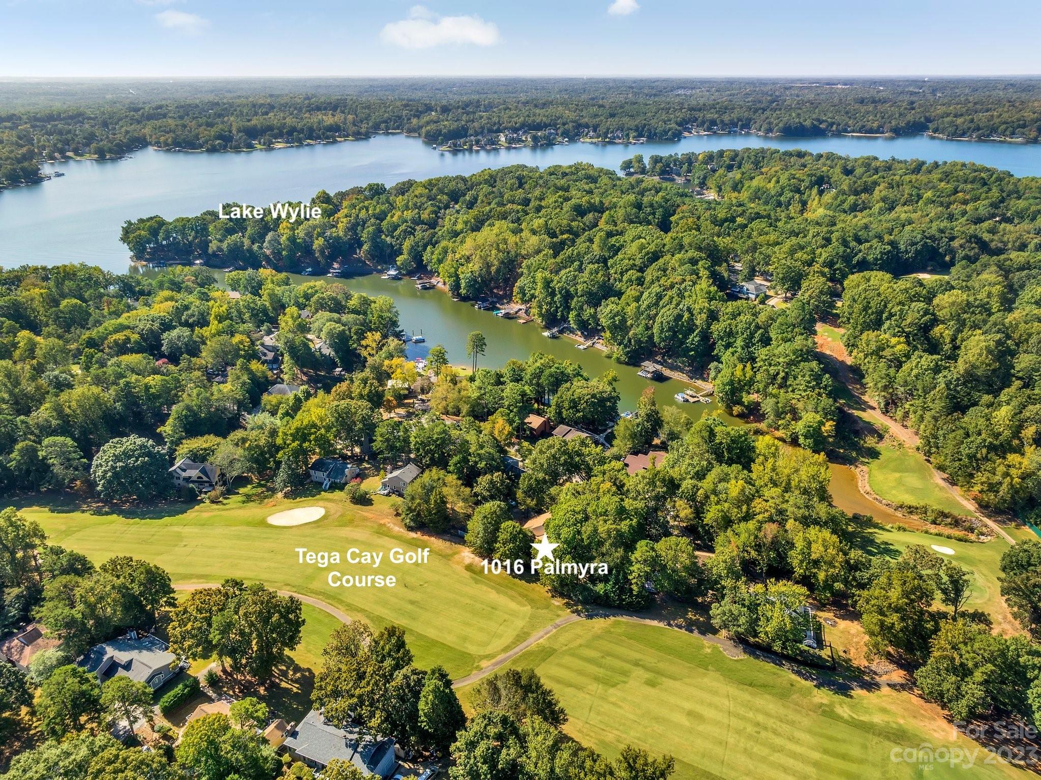 a view of a lake with a yard