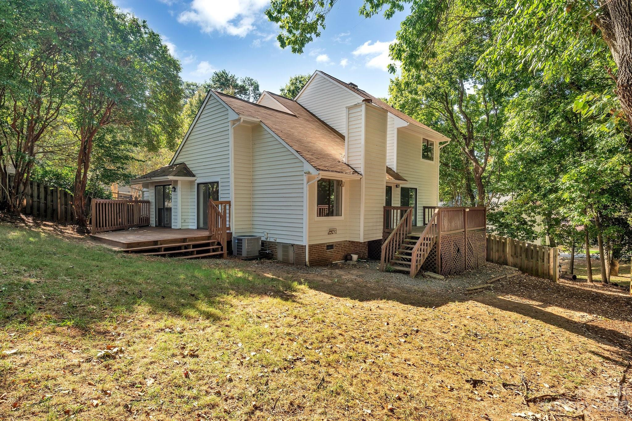 1016 Palmyra Drive Tega Cay, SC 29708 - Photo 26 of 33 a view of a house with backyard