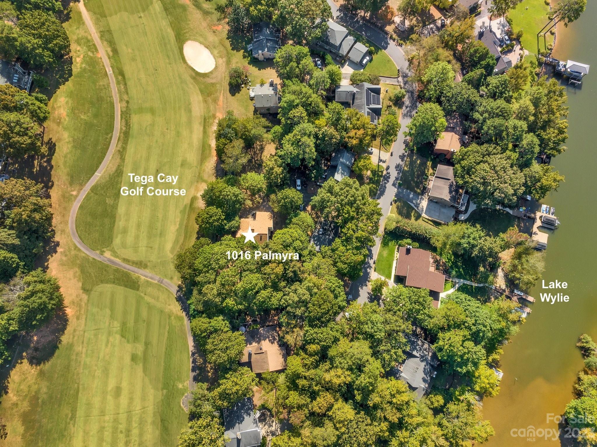 1016 Palmyra Drive Tega Cay, SC 29708 - Photo 3 of 33 a view of a garden