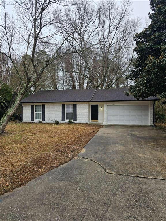 3305 Valley Bend Road South Fulton, GA 30349 - Photo 1 of 1 front view of a house with a yard